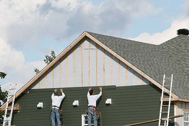 Professional Siding Installation technician working in Plymouth, CT